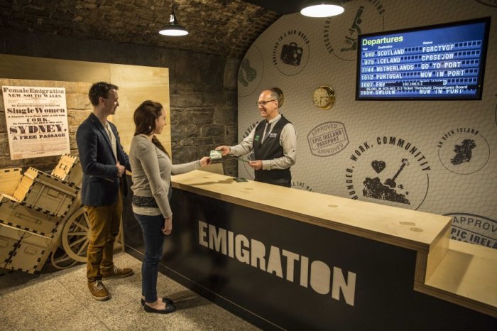 A couple purchasing tickets to Epic Irish Emigration Museum Exhibition