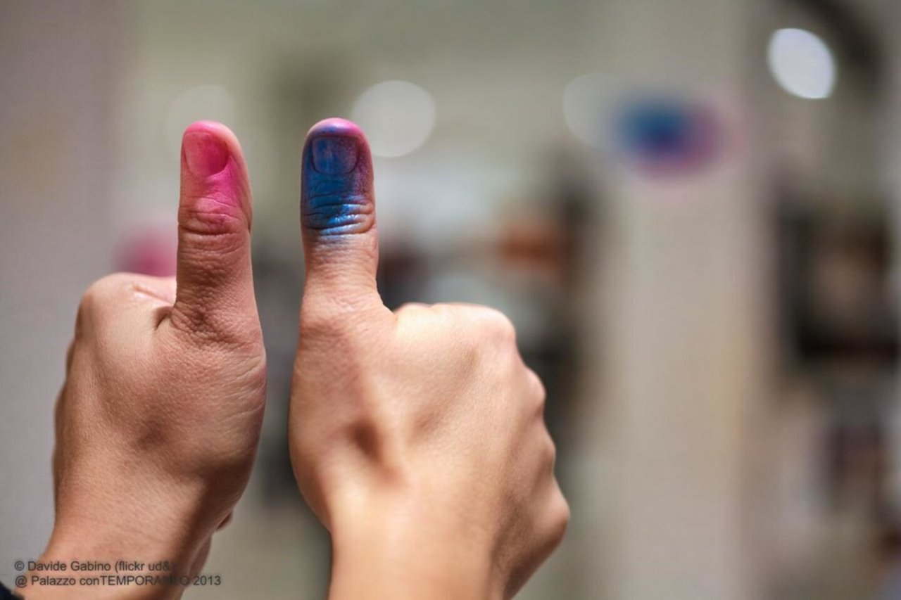 pink,blue,thumbs up, blurred background, right hand left hand 