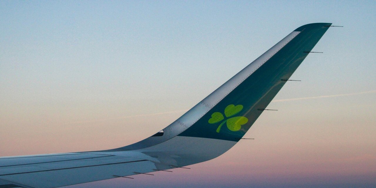 wind of an aer lingus plane during sunrise 