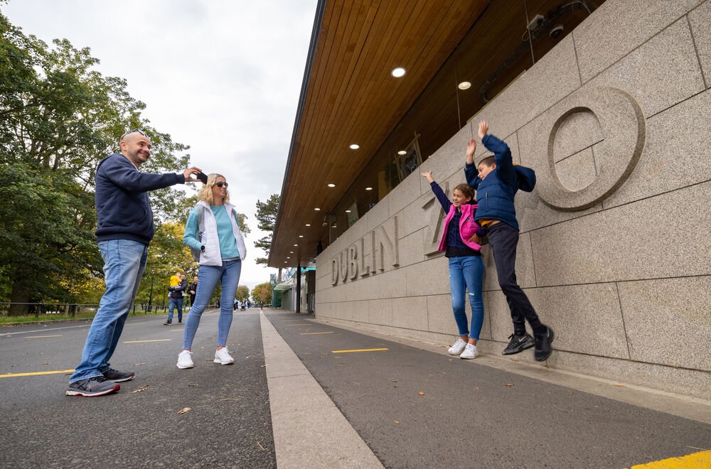 Kids jumping in the air outside Dublin Zoo