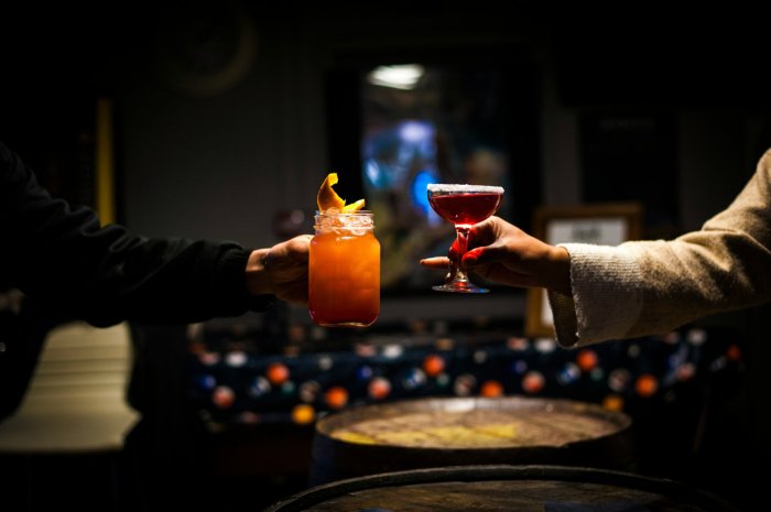 cheering drinks in a pub setting