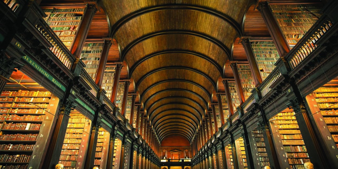 rows of shelfs inside the long room trinity college