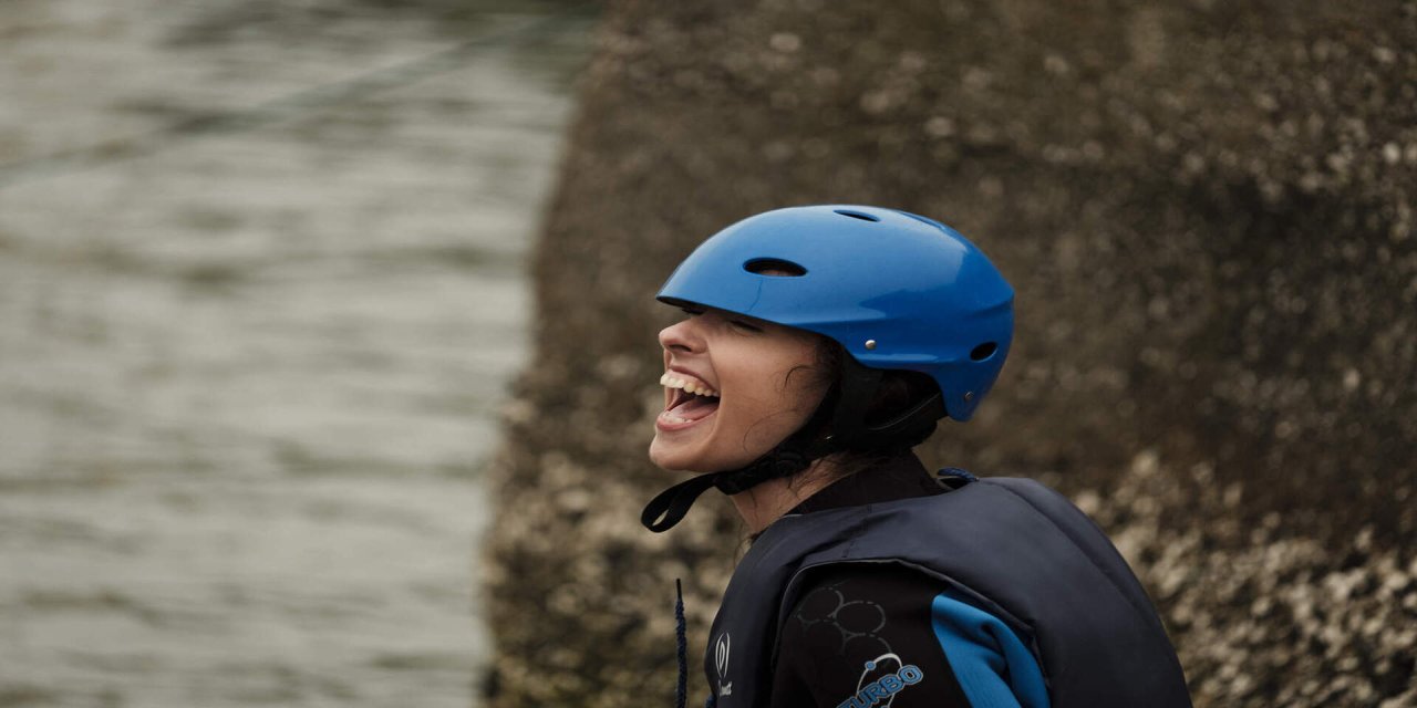 kayaking group laughing 