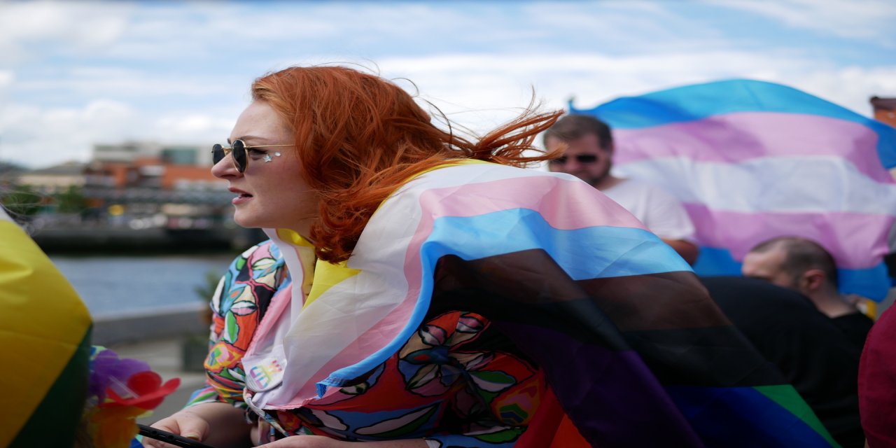 woman with lgbtq flag 