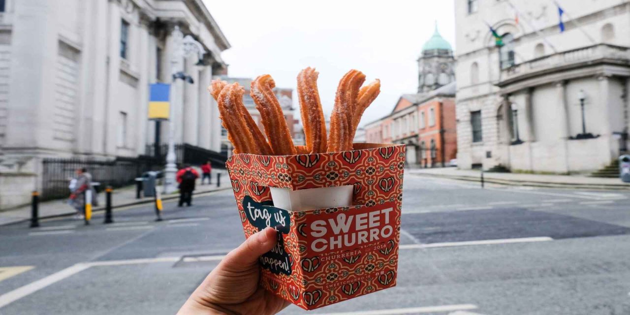 Churros infront of grey buildings