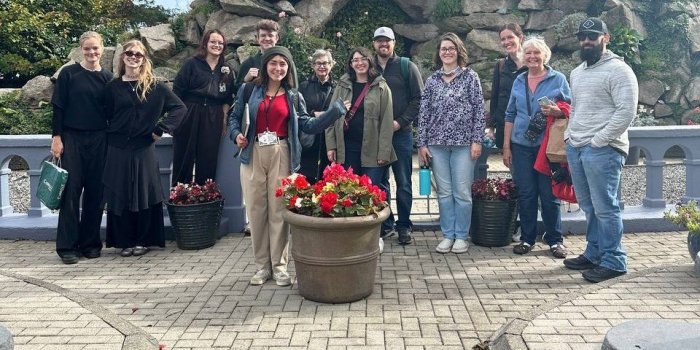 Explore Galway With Candela large group in front of stone building