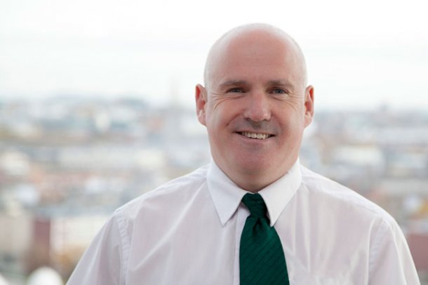 Dodublin's bus guide & driver Martin Connolly with panoramic view of Dublin