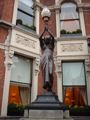 Image of building with statue in front 