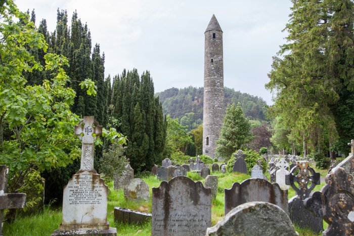 Monastic tower and graveyard in glendalough