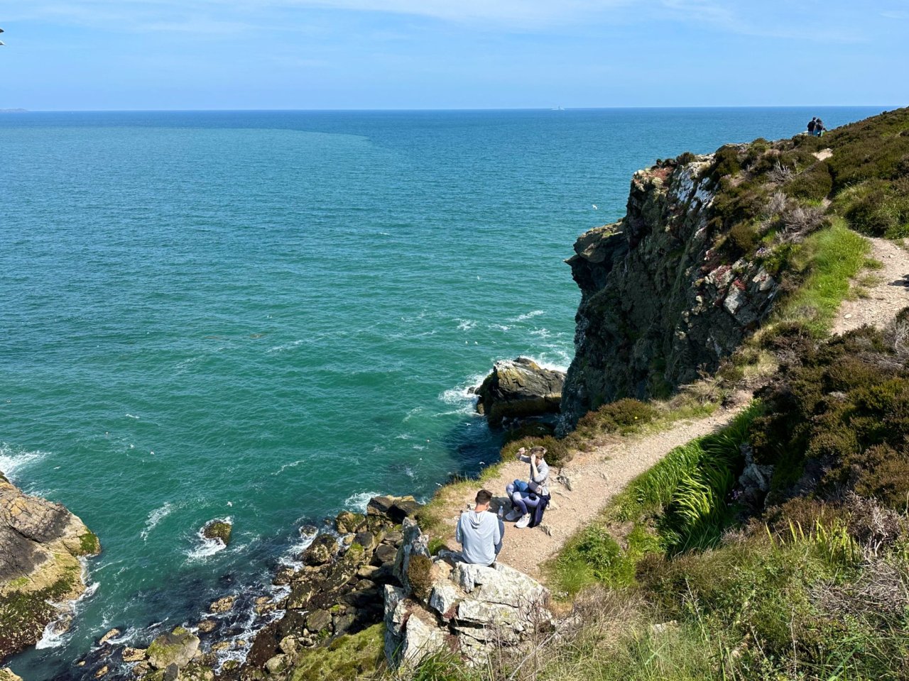 people on a cliff