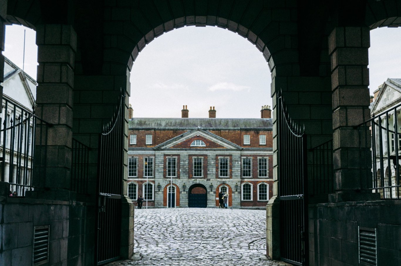 Dublin castle courtyard through arch view