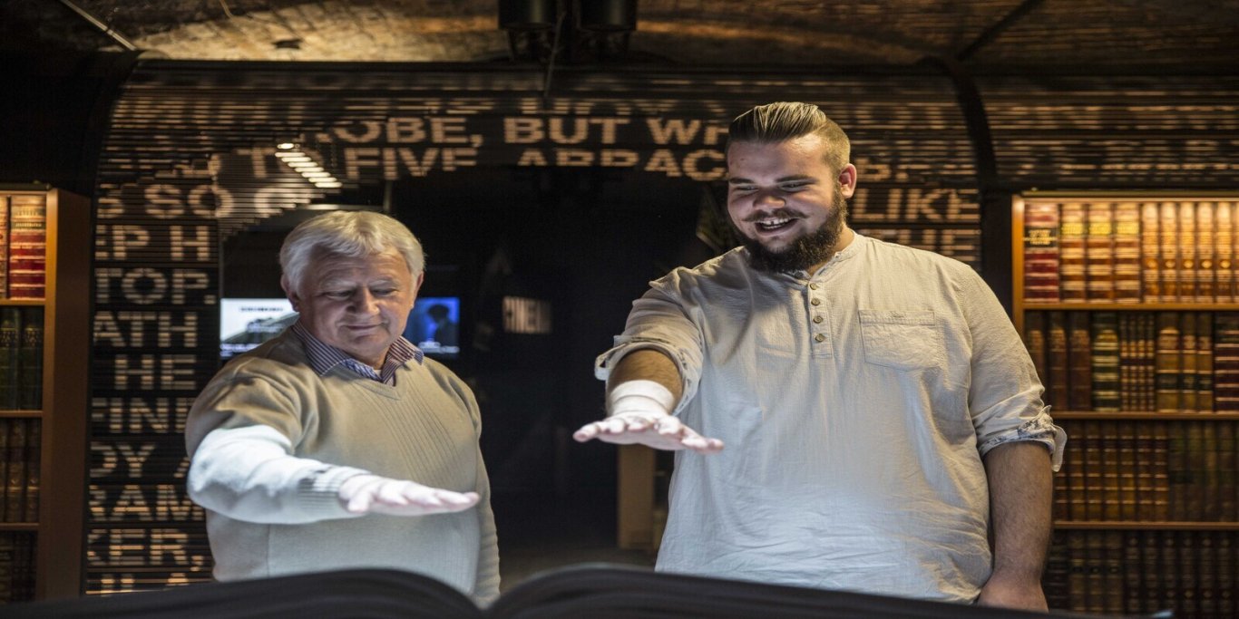 EPIC Museum two visitors interacting with exhibition