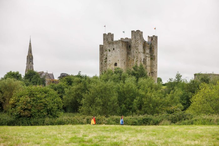 Boyne Valley, Co Meath_Web Size Courtesy Fáilte Ireland Visitors strolling at the foot of Trim Castle