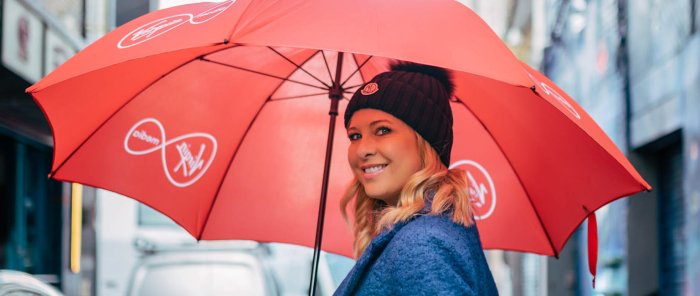 lady holding umbrella in dublin ireland