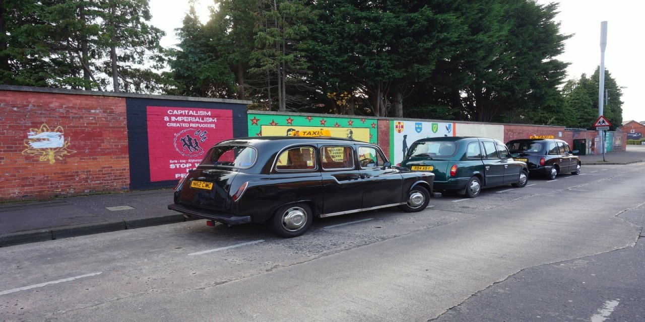 black taxis lined up 