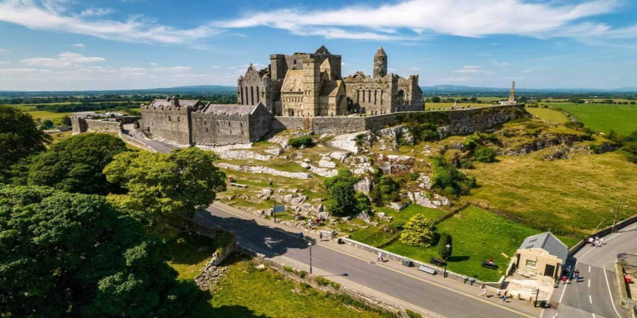 irish castle surrounded by greenery