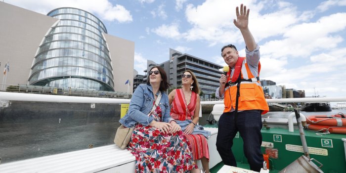 Old Liffey Ferry Boat Tour three people on a boat