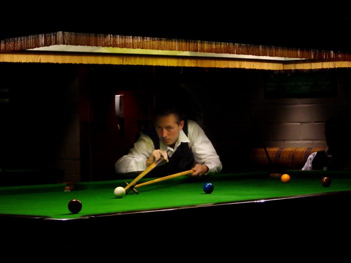 man at snooker table