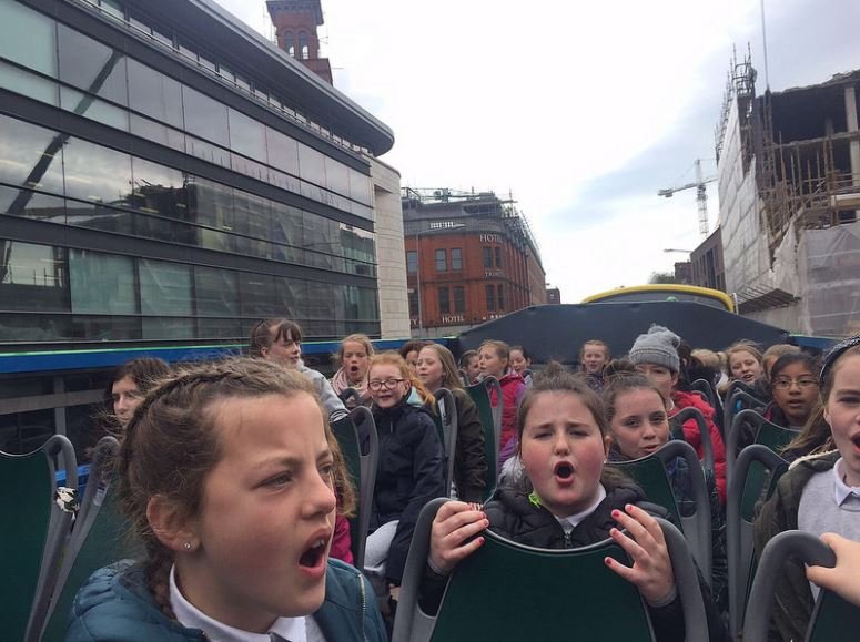 Kids on the open top bus